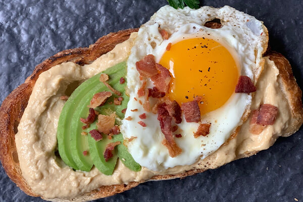 Bacon & Avocado Breakfast Hummus Toast